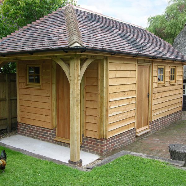 This oak barn was partitioned to create both a workshop area and a habitable space.